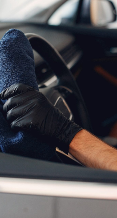 man-washing-his-car-garage_optimized